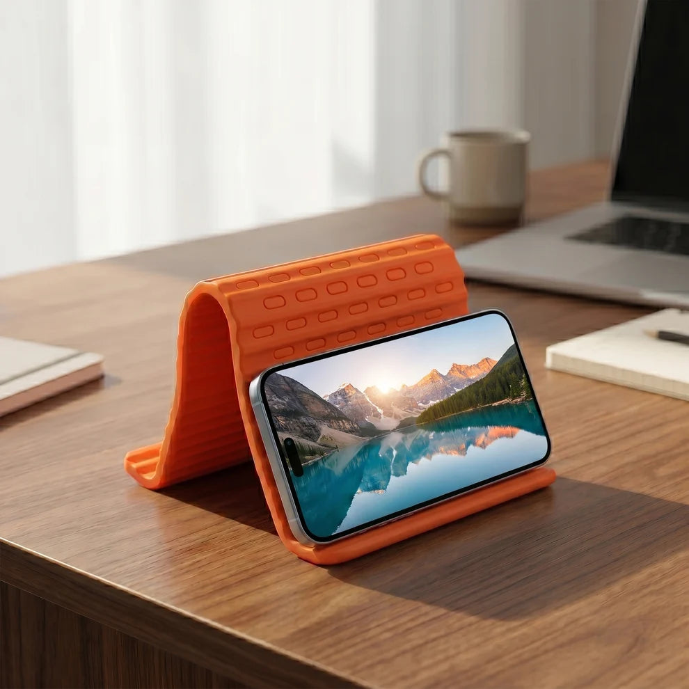 Foldable Silicone Phone Stand| Adjustable Mobile Phone Holder with Anti-Slip Base| Flexible Desktop Stand for Smartphones| Portable Phone Mount for Home| Office, Travel & Video Calls (Orange, 1 Pack)