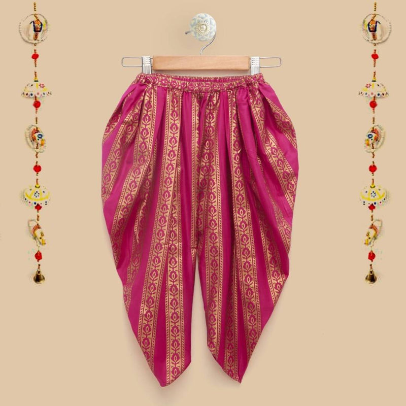 The Magic Wand Baby Girls Ethnic Wear One Shoulder Embellished Net Crop Top With Gold Foil Printed Dhoti Set in Orange and Fuchsia Color